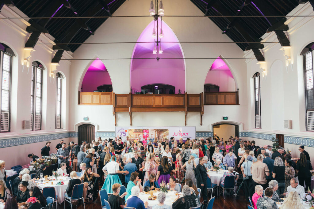 Juniper staff and customers enjoy a 75th birthday party at Perth Town Hall